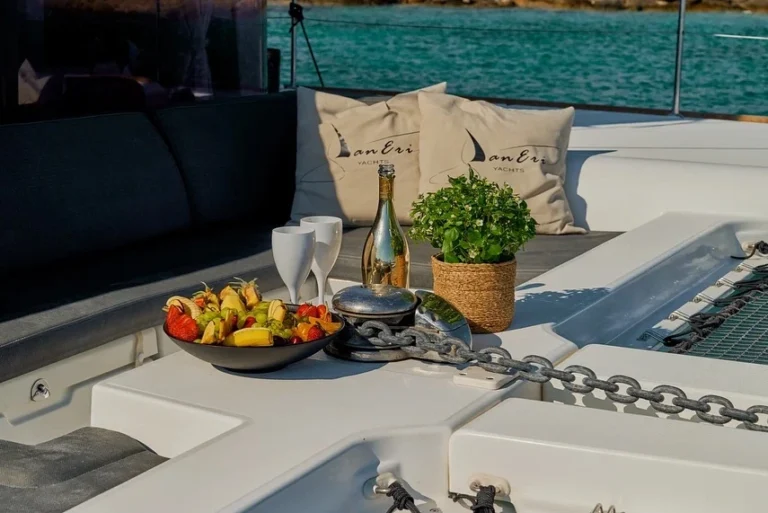 plate of fruit served on a catamaran