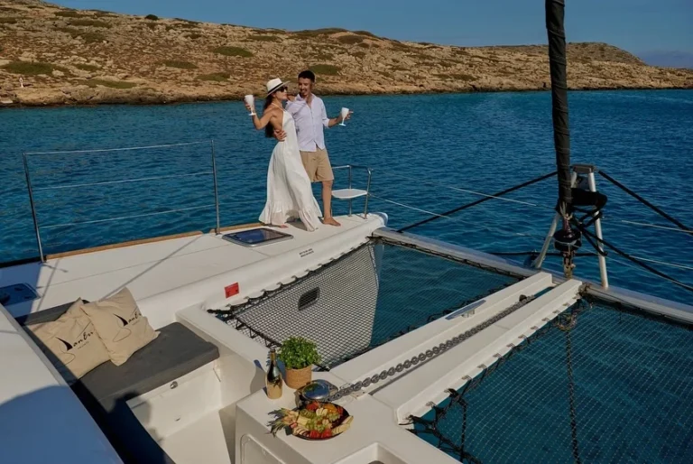 couple on board of a catamaran